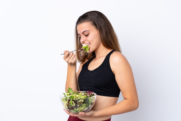 Teenager girl with salad