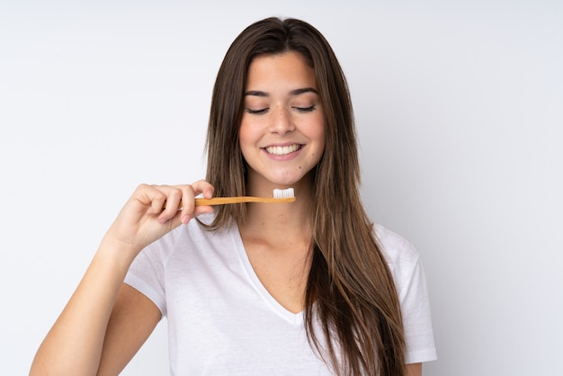 Teenager girl with a toothbrush