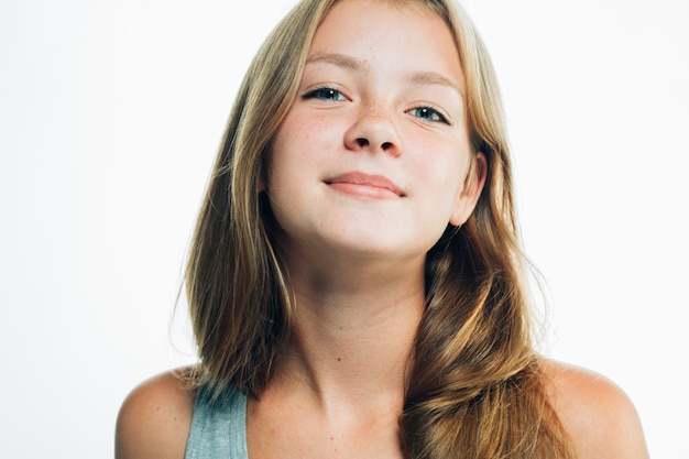 Teenager girl woman female portrait freckles face isolated on white. Studio shot.