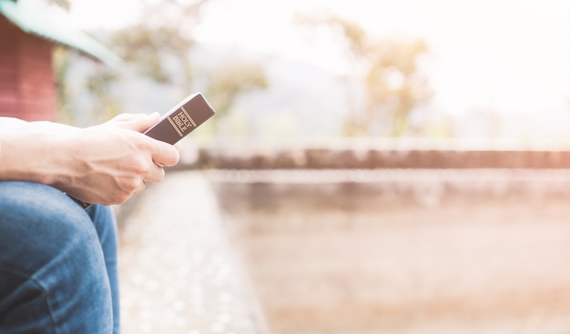 Teenager holding Holy bible ready to read.