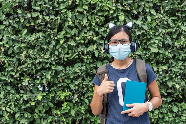 Teenager ready to go to school in pandemic