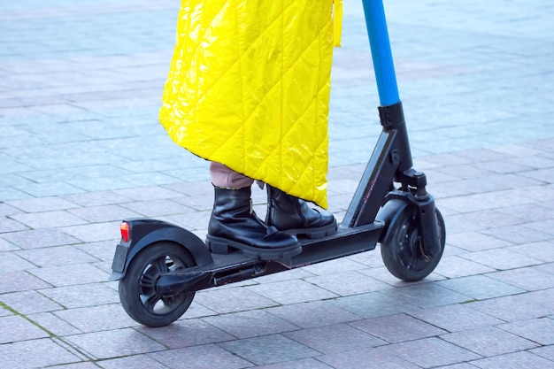 Teenager rides an electric scooter transportation for the city