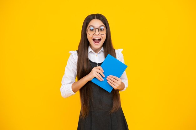 Teenager school girl study with books Learning knowledge and kids education concept Excited face cheerful emotions of teenager girl