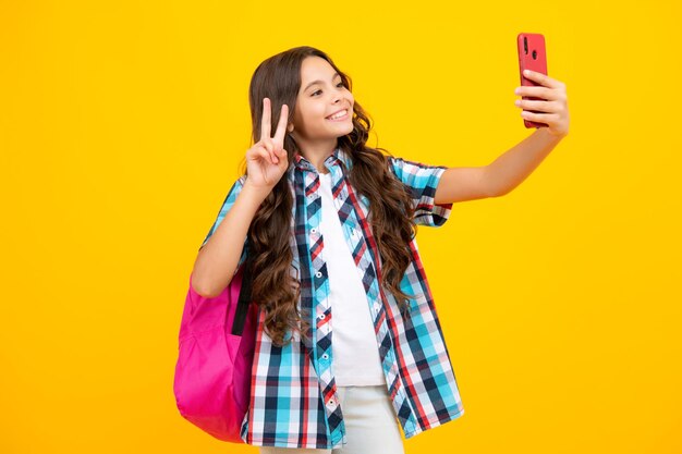 Teenager school student girl with mobile phone