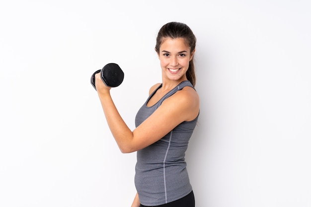 Teenager sport girl over isolated white wall