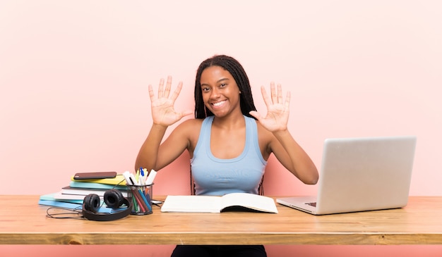 Teenager student girl counting ten with fingers