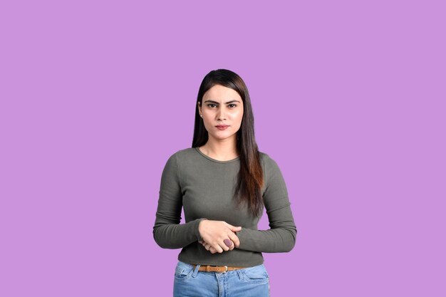 Teenager student girl happy on purple background indian pakistani model