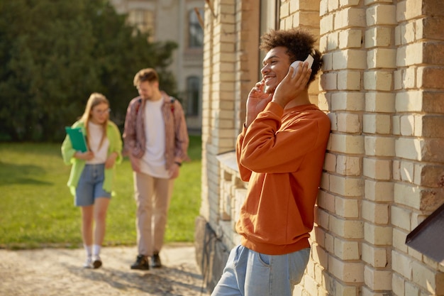 Teenager students at university campus after day of class