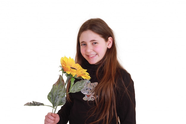 Teenager with sunflowers