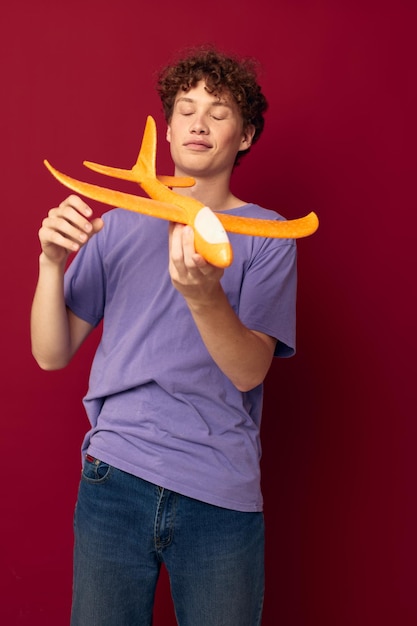 Teenager yellow plane posing fun Lifestyle unaltered