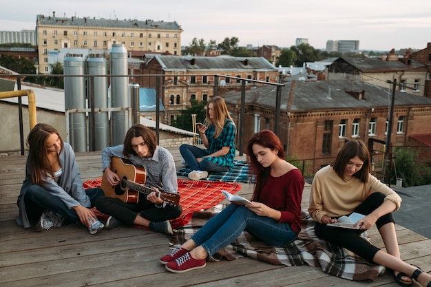 Teenagers pastime. Relaxed and quiet leisure. Hipster subculture of intelligent educated and self reliant youth