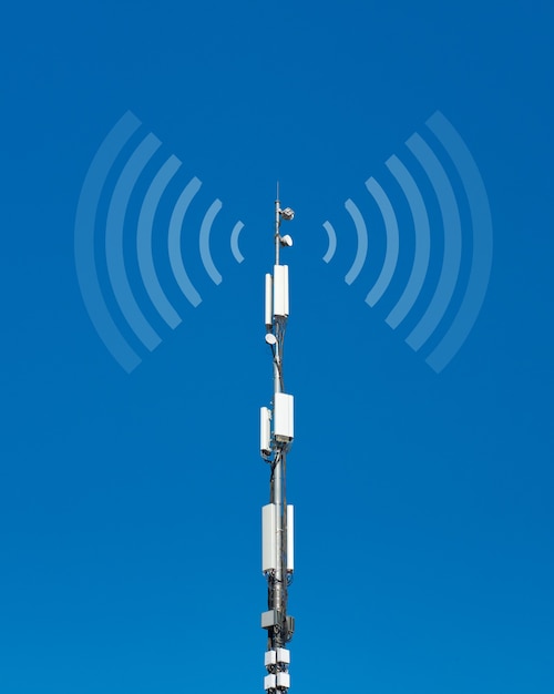 Premium Photo Telecommunication cell tower antenna against blue sky Premium Photo Telecommunication cell tower antenna against blue sky