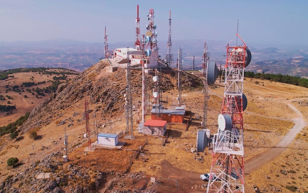 Telecommunications station. radio, television, mobile and\
internet antennas. close aerial view.