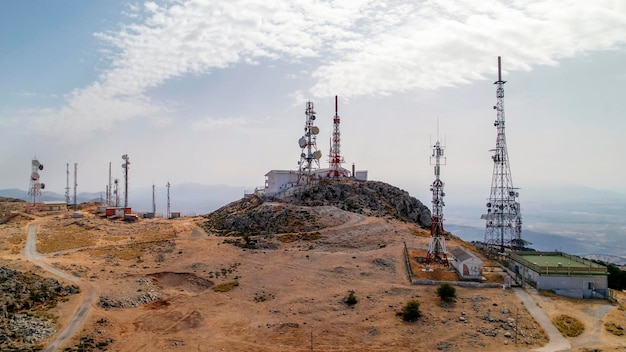 Telecommunications station. radio, television, mobile and\
internet antennas. panoramic aerial view.