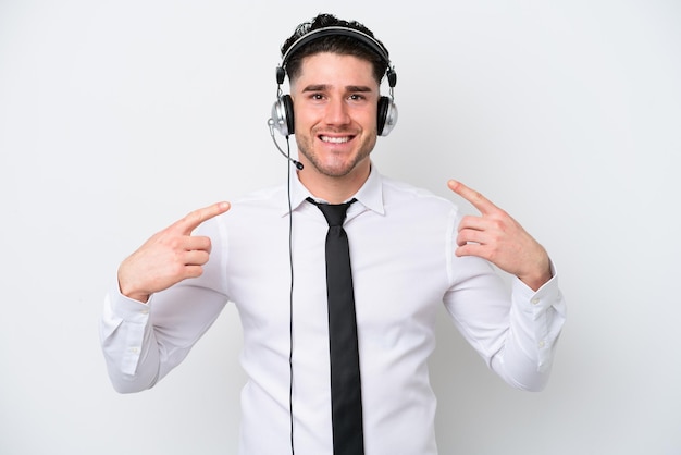Telemarketer caucasian man isolated on white background giving a thumbs up gesture