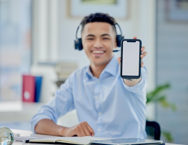 Telemarketing mockup and man with a smartphone call center and advertising with customer service ecommerce or employee Person agent or consultant with a cellphone screen website or tech support