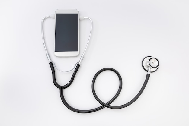 Telemedicine. Smartphone en stethoscoop, gezondheidszorg, geneeskunde, ziekenhuis