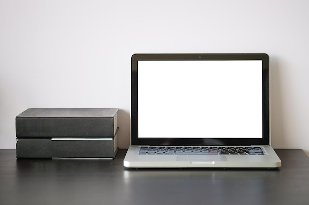 Telephone booth on table against white background