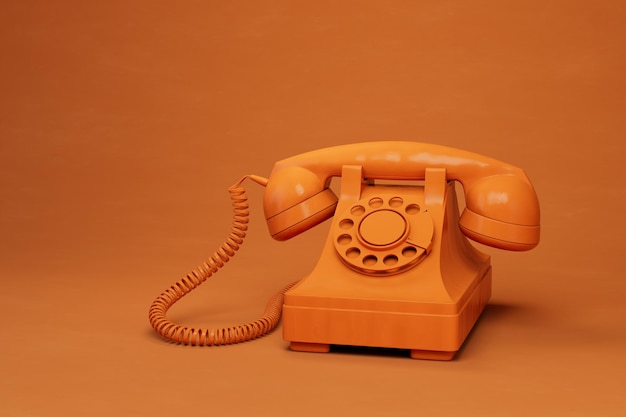телефонная связь. старый проводной телефон. старый ретро телефон оранжевого цвета на оранжевом фоне