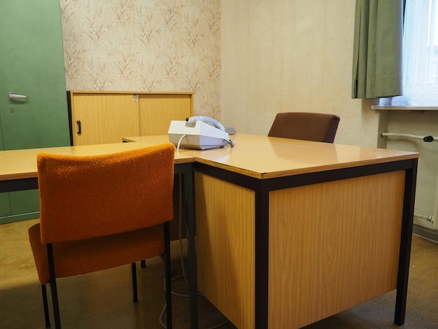 Telephone on table in room at prison