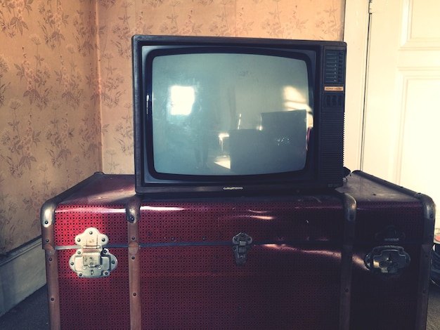 Photo television set on suitcase