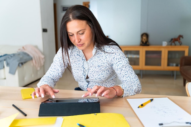 Teleworking from home Middle aged Romanian business woman