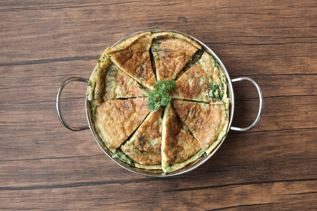 Telur dadar goreng or Indonesian Fried Eggs omelet. Mixed eggs with onion celery garlic seasoning. 
