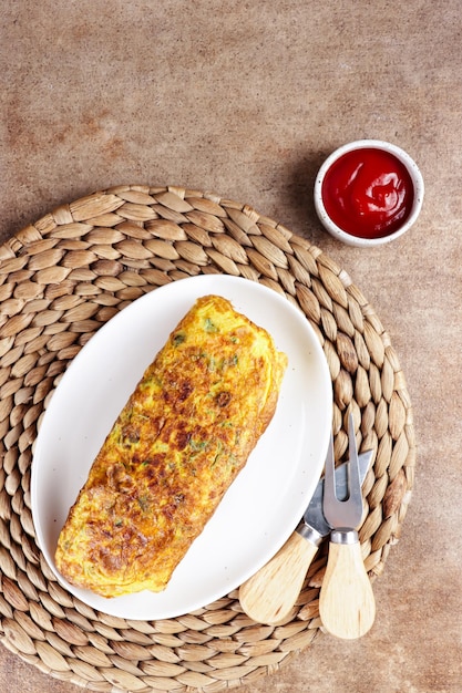 Telur dadar gulung Tamagoyaki or Japanses egg roll Gyeran Mari or Korean Rolled Omelette