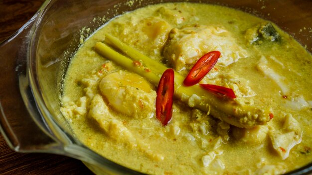 Photo telur masak lemak cili padi or egg in coconut with birds eye chilli