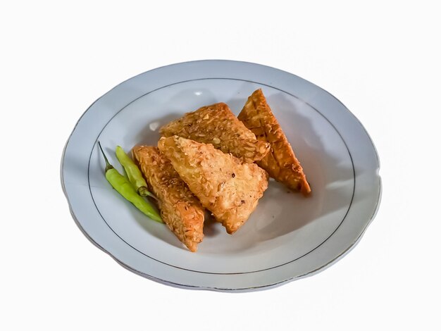 Tempe mendoan Triangular fried tempeh wrapped in wheat flour produces a savory taste