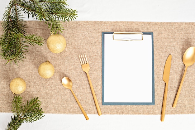 Template of Christmas table decoration with guest invitation card