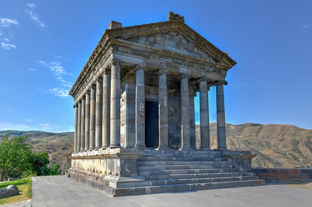 Photo temple of garni an ionic pagan temple located in the village of garni armenia it is the bestknown structure and symbol of prechristian armenia