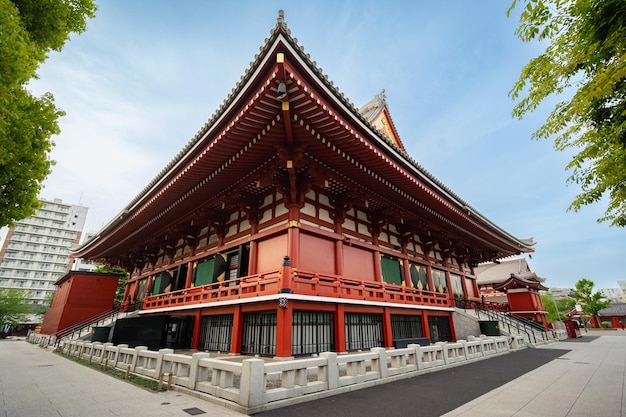 A temple with a red roof and a red roof