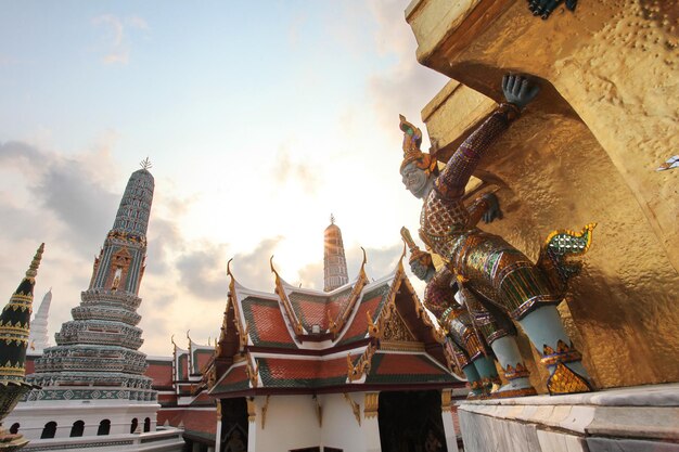 A temple with a tower in the background