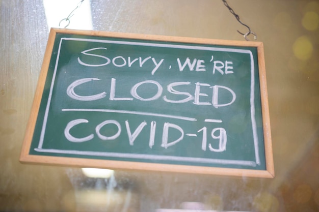 Temporarily closed sign for Covid19 in small business activity