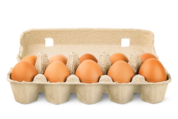 Ten eggs in a carton box on an isolated white background