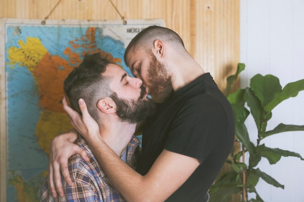 Photo tender kiss of gay couple in love
