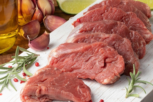 Tenderloin steaks on cutting board Selective focus