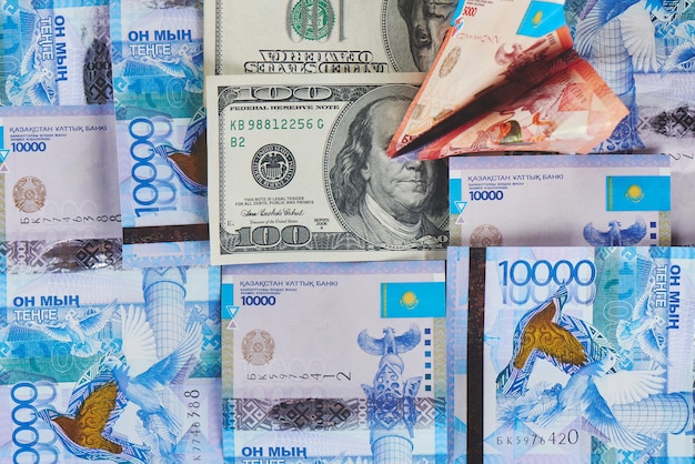 Tenge. Kazakh money and dollars. Background of the money.