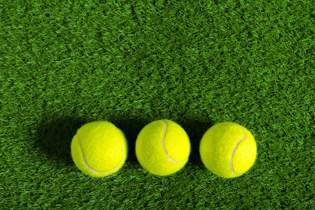 Tennis ball on green grass