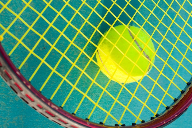 Tennis ball and racket.