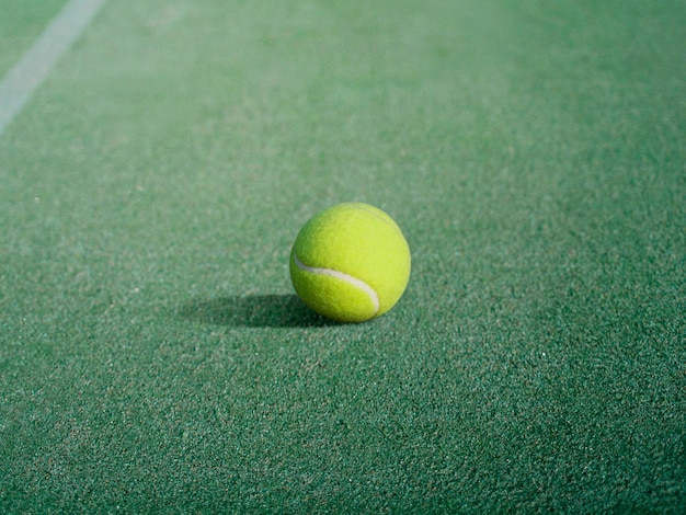 Tennis ball in tennis court