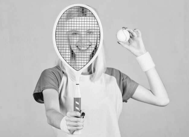 Photo tennis club concept tennis sport and entertainment active leisure and hobby girl fit slim blonde play tennis sport for maintaining health active lifestyle woman hold tennis racket in hand