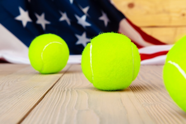 Tennis equipment on wooden surface, close up