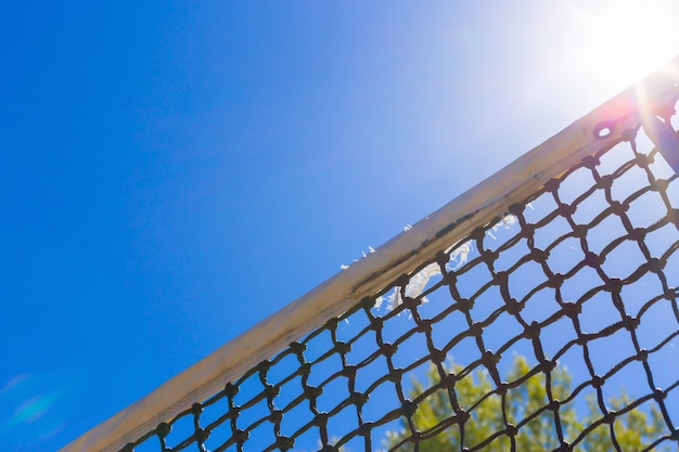 Tennis net on blue sky