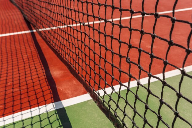 Tennis net on a tennis court background