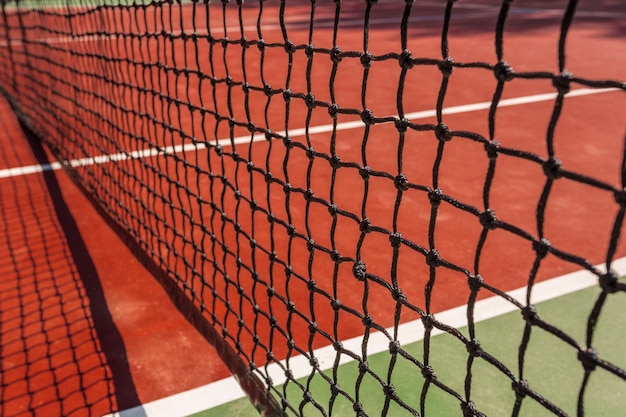 Tennis net on a tennis court