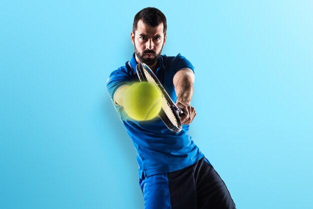 Tennis player on colorful background