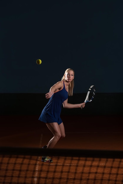 Tennis Player Hitting Tennis Ball