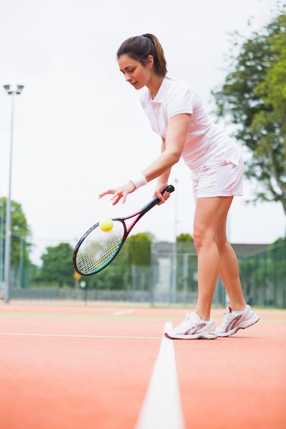 Tennis player playing a match on the court